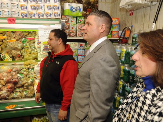 Fayer’s Market Owner Yobani Valdez (left) gives Assemblyman Lou Greenwald and Assemblywoman Pamela Lampitt a tour of the healthier options his store provides as part of the New Jersey Corner Store Initiative.